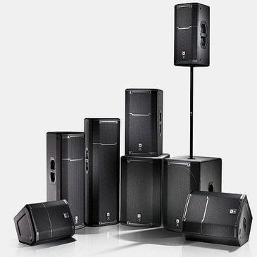 A set of black professional speakers and subwoofers.