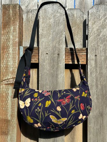 Crosstown Crescent Hand bag