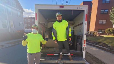 Marvin junk removal crew in Melrose ma truck loaded 781 267 5966 appliance pickup Melrose ma 02176.