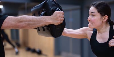 Beginner practising Krav Maga striking at an Echelon trial class in London