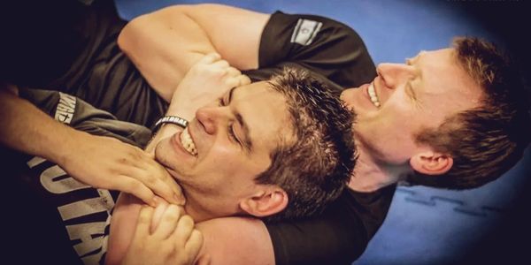 Two Krav Maga instructors training with a headlock technique – Echelon Self-Defence London
