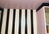 Intricate painted striped pattern for a special look in a craft room.