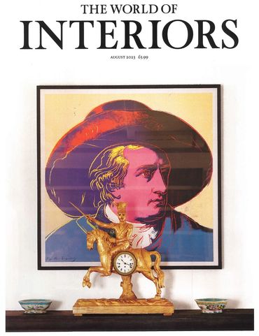 The World of Interiors magazine front cover for August 2023  issue showing Goethe painting and clock