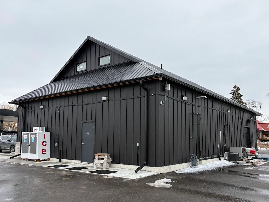 Seamless 6" eavestrough installation on a Southern Ontario Retail Store — Anderson Aluminum