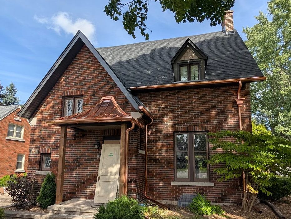 Copper half-round eavestrough installation on a residential home  in Brant— Anderson Aluminum