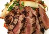 NY Strip Steak over Beet Noodles, Carrots, Bock Choy and Pickled Ginger