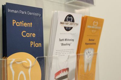 Dental brochures in a holder.