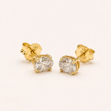 18ct yellow gold claw set 1.00ct total weight Oval Lab Diamond earrings.