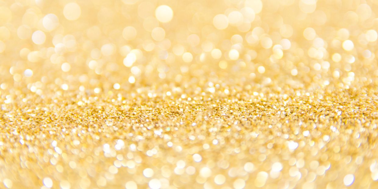 Gold bokeh image to depict Gold Leaf art form