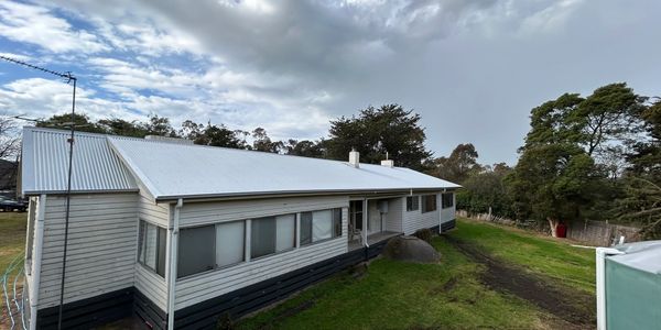 reroof spout down