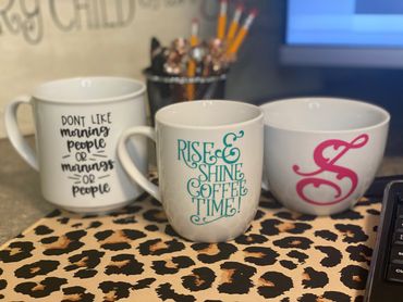 Custom coffee mugs on desk