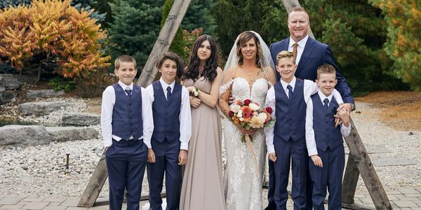 Our family of 7 after our wedding in fall of 2022