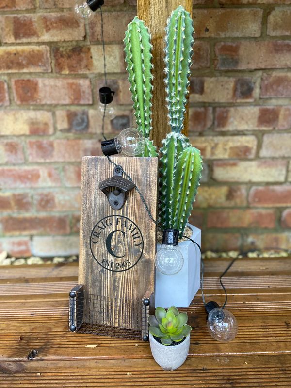 Solid wood bottle opener with built in bottle cap catcher