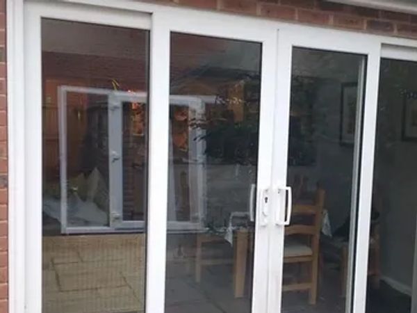 White Upvc Sliding Patio Door Fitted by Sheffield Composite Doors in Killermarsh.