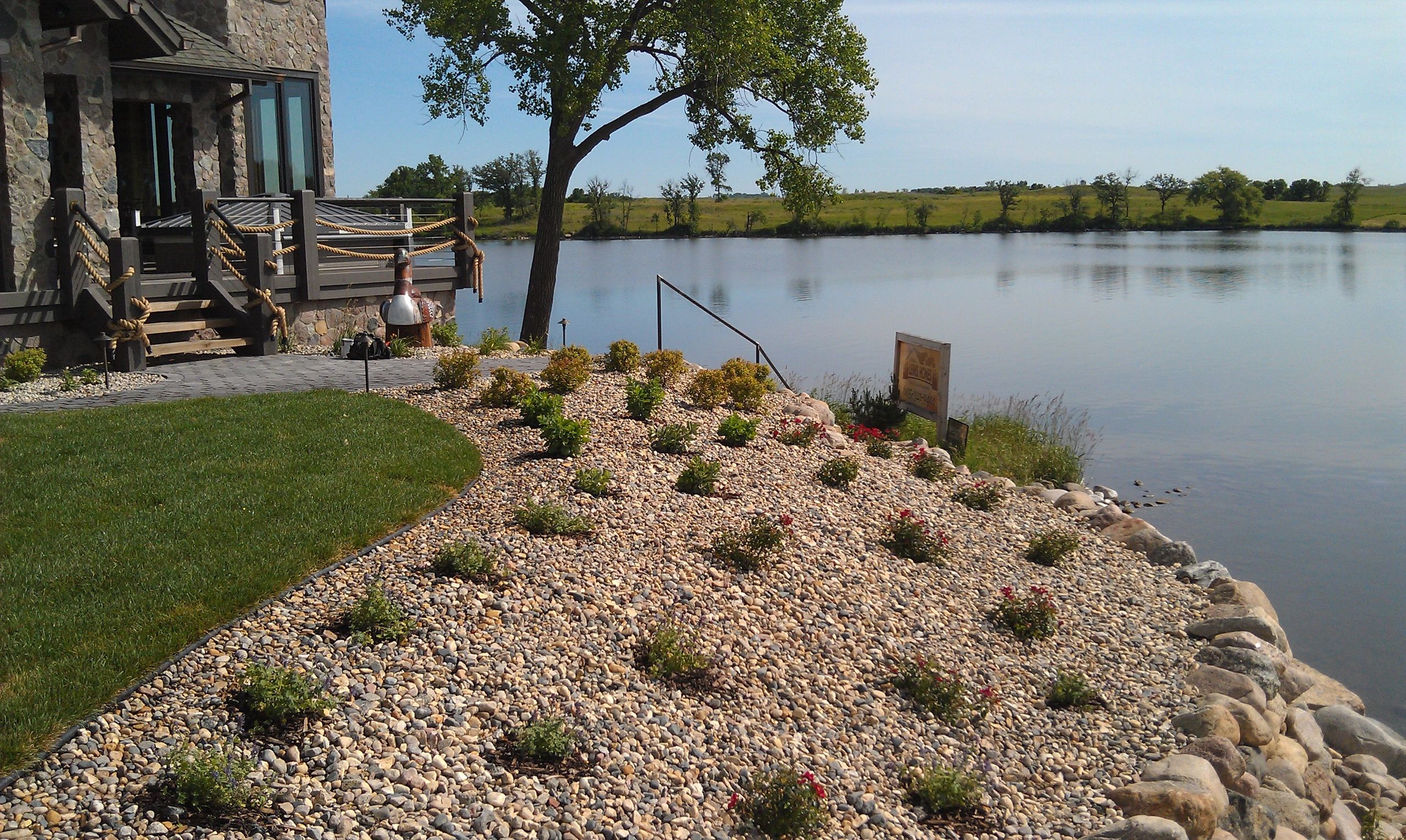 Sioux Falls Landscaper Rock Retaining Wall To Avoid Soil Erosion