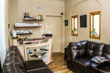 Reception area with couches and desk