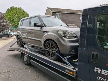 A nice Kia with a starter motor issue needing to get to the local garage for repairs. car recovery