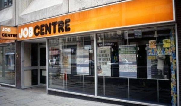 Empty job centre with bright orange sign.
