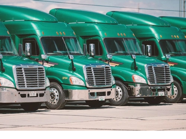 A few trucks parked ready to hit the road.