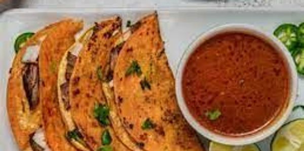 Our most requested dish Quesabirria Tacos!