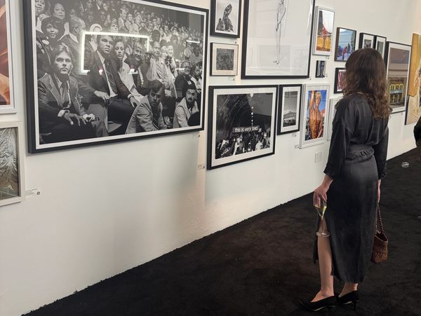 Woman looking at art in an exhibition.