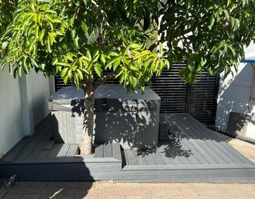 Composite deck around spa