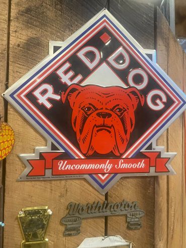 Vintage Red Dog beer sign with bulldog graphic.
