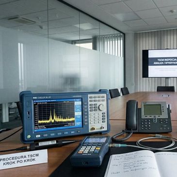 Workplace with measuring instruments and notes.