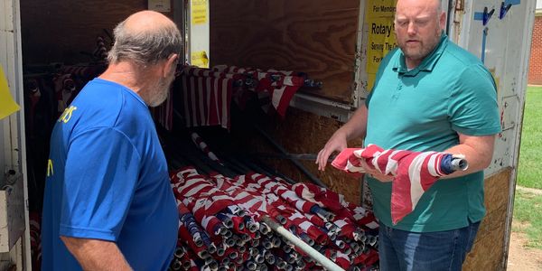 Rotary Club of Terrell preparing flags for Flag Day