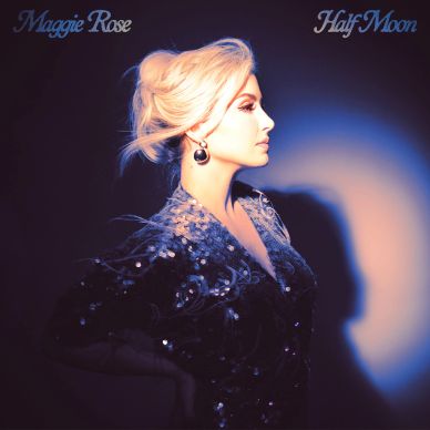 Profile of a woman in glittery dress with blue background.