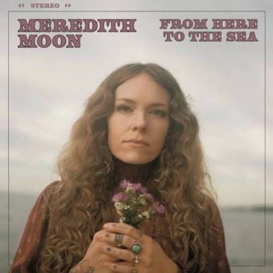Album cover of Meredith Moon holding flowers.