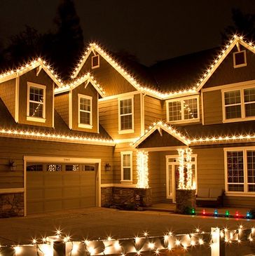 Bright Christmas Lights Installed on the roofline of a home