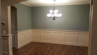wainscoting, crown molding, accent wall
