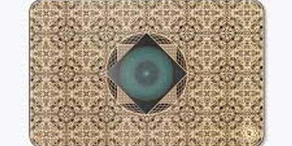 Intricate geometric pattern with a central blue-green eye-like design.