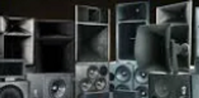 A collection of various large loudspeakers and audio equipment.