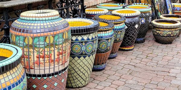 Large group of tile pots and murals 