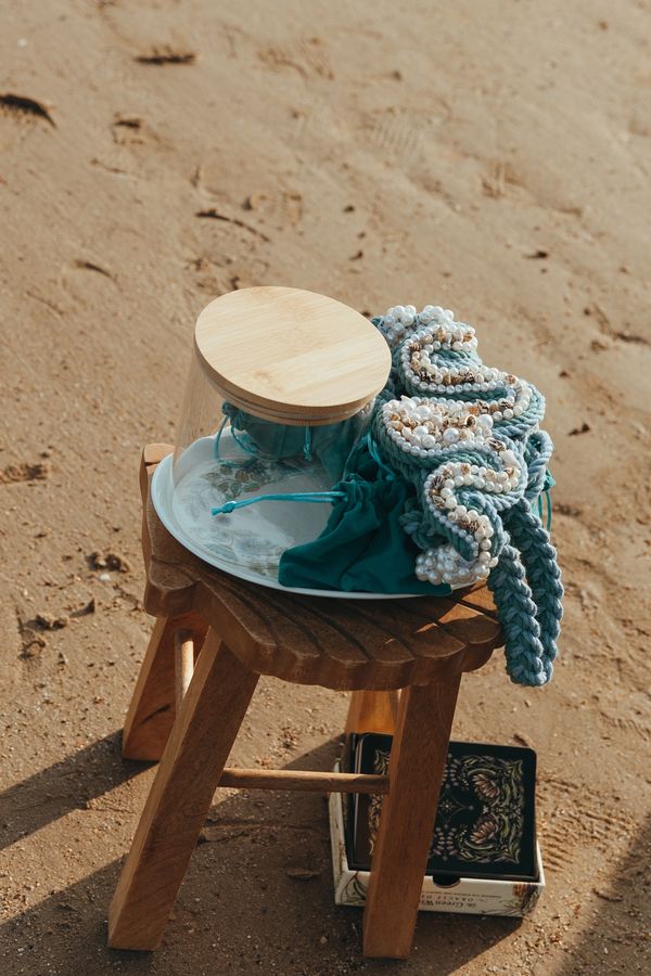Intuition-led crystal ritual with beautiful raw crystals and handfasting cord for elopement wedding