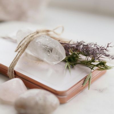 Crystal over a deck of cards with sprig of lavender. 