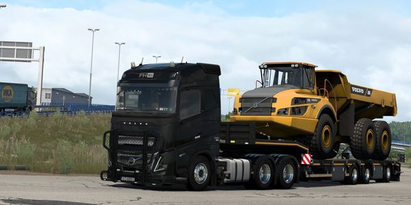 Sokolowski Transport Black Volvo truck carrying a yellow Volvo construction vehicle. ETS2.