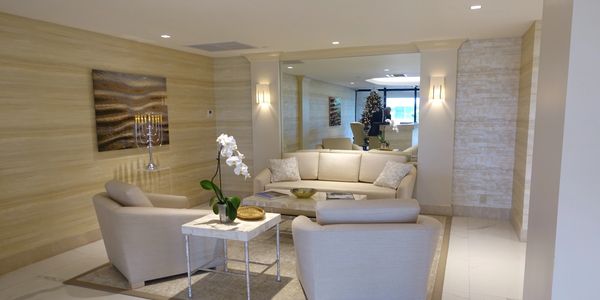 Halcyon with white flowers, 3440 S Ocean Blvd, Palm Beach, lobby