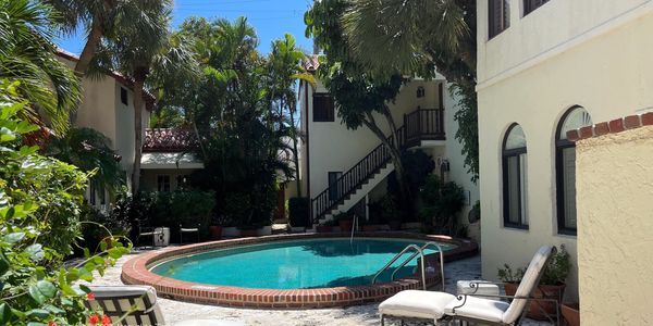 Casa 214, 214 Chilean Ave., Palm Beach,  condos for sale, flowers, loungers by pool
