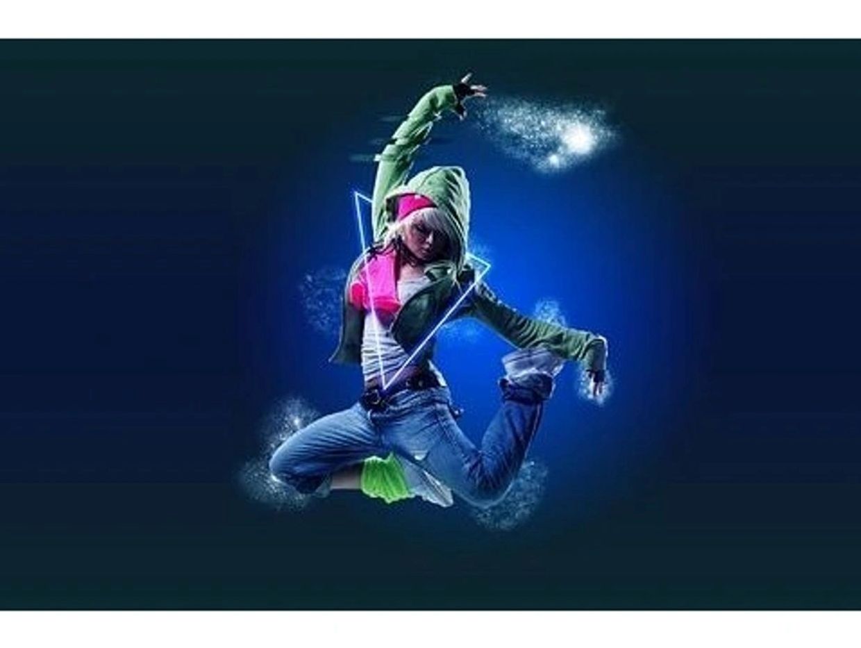 Energetic dancer in mid-air leap with neon effects and vibrant outfit.