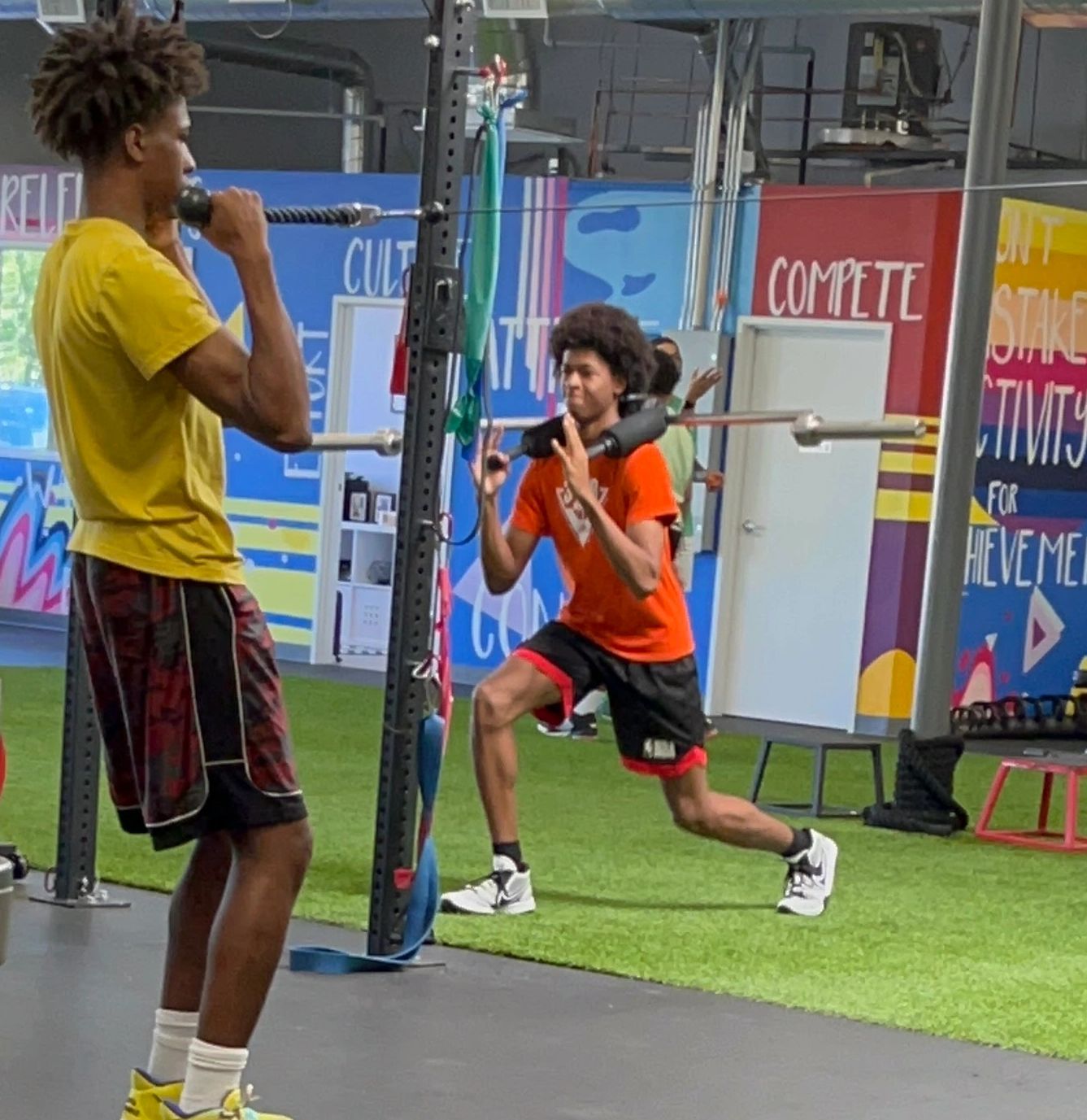 Kevin Jr & Kallai learning and working out at MOVE Performance.