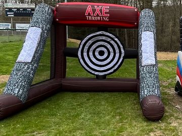 Inflatable axe throwing game . Comes with soft axes. 