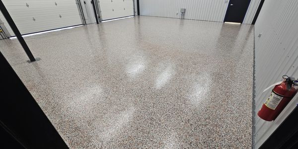 Epoxy or polyaspartic shop floor coating