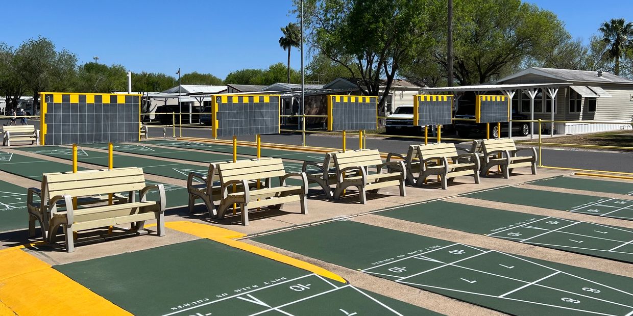 Shuffleboard courts at at Trophy Gardens RV Resort