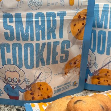 Packaging of chocolate chip cookies labeled 'Smart Cookies' with a cartoon professor.