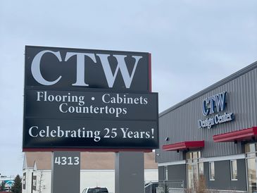 shows the outside of a flooring, cabinetry, and countertop showroom called CTW