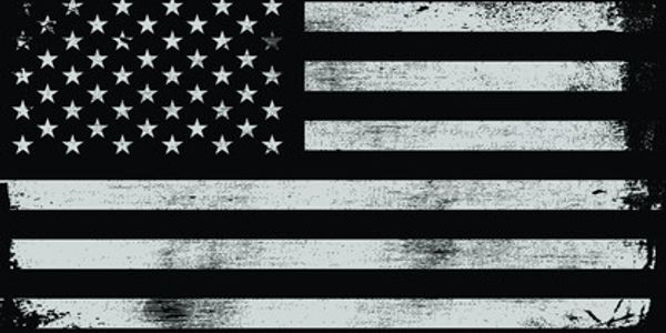 Black and white American flag with a distressed texture.
