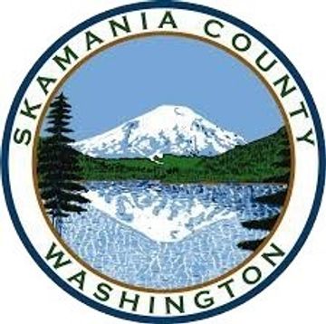Seal of Skamania County, Washington, featuring a mountain and lake.